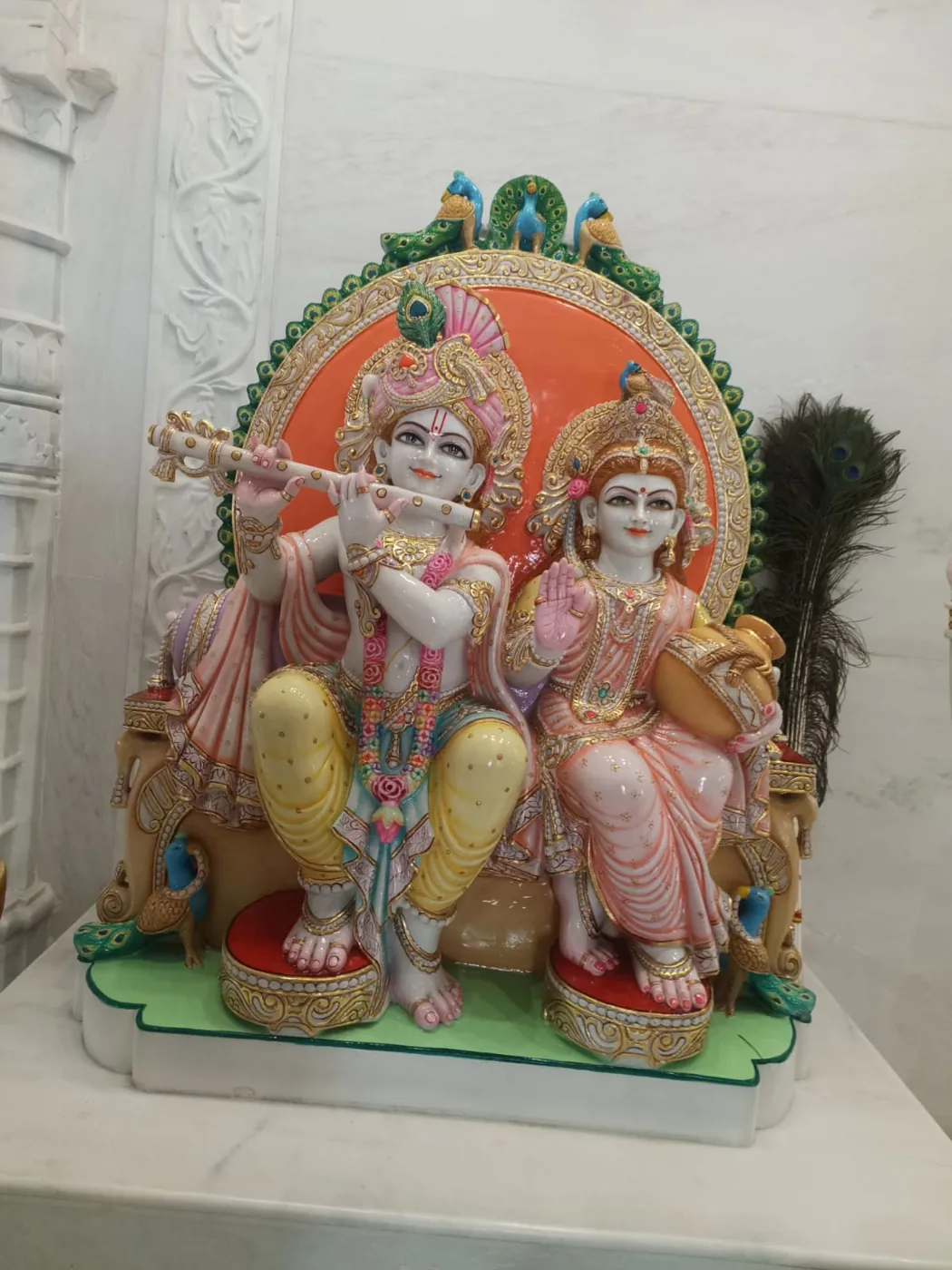 Marble Radha Krishna murti installed in a decorated mandir
