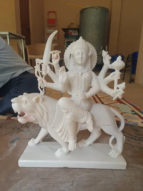White marble Durga maa murti with lion handcrafted by Raadhaye Arts